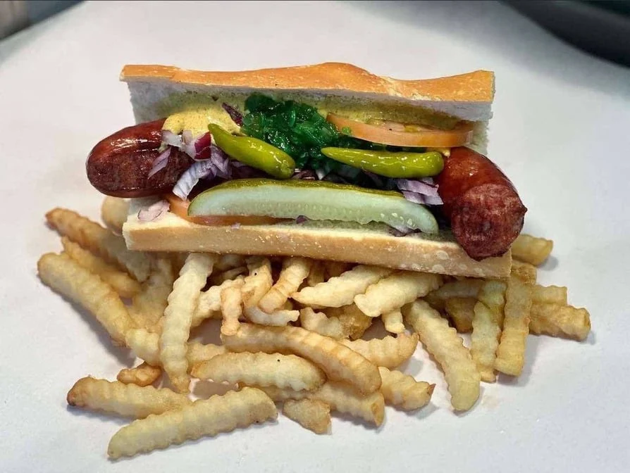 Chicago-style hot dog piled on crinkle-cut fries